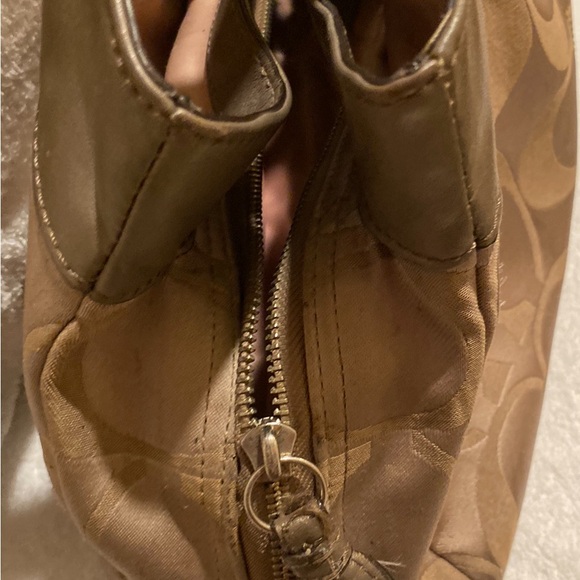 Coach signature purse has lots of pockets still in good condition. - Picture 10 of 11